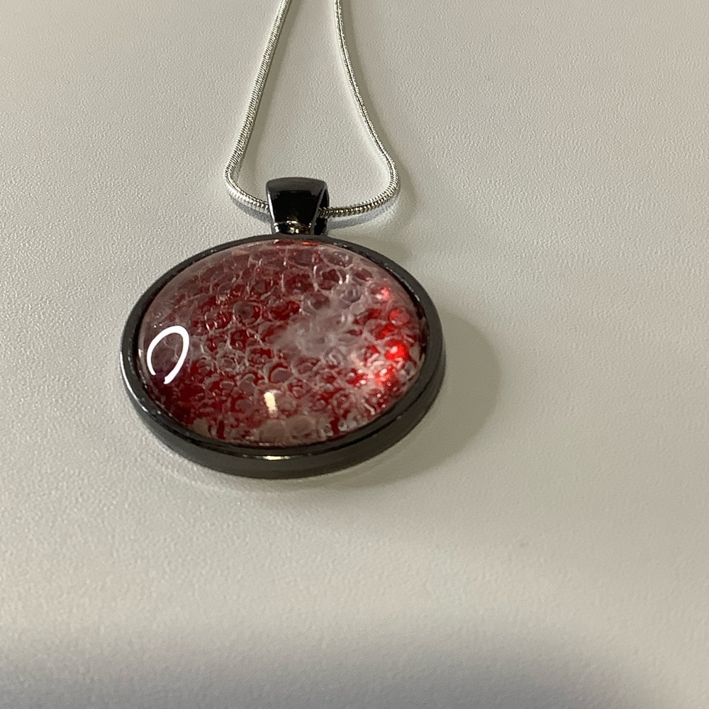 Red snakeskin pendant